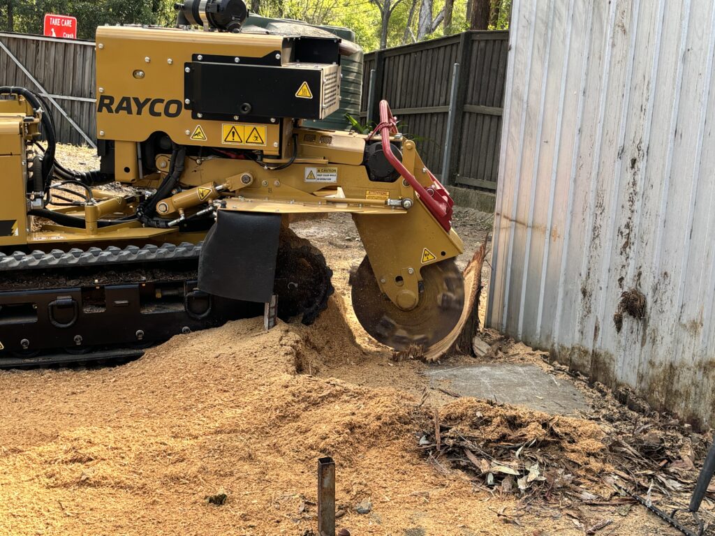 Stump Grinding Machine grinding a stump